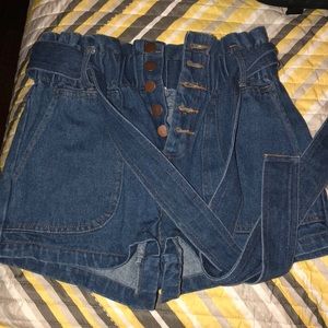 Paper bag styled jean shorts.